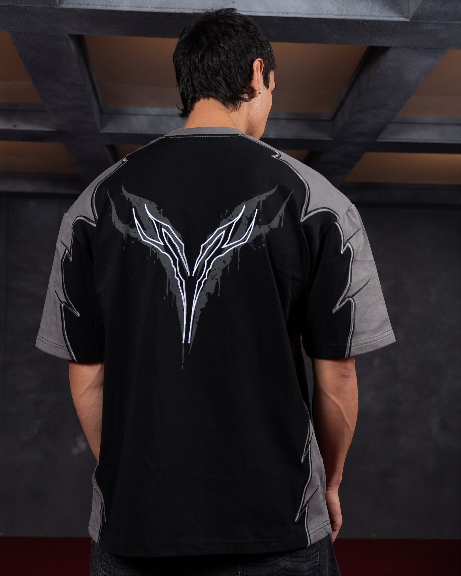 Berserker Armor Tee by Aniqi, oversized black and gray cut-and-sew Berserk inspired shirt product photo from Aniqi